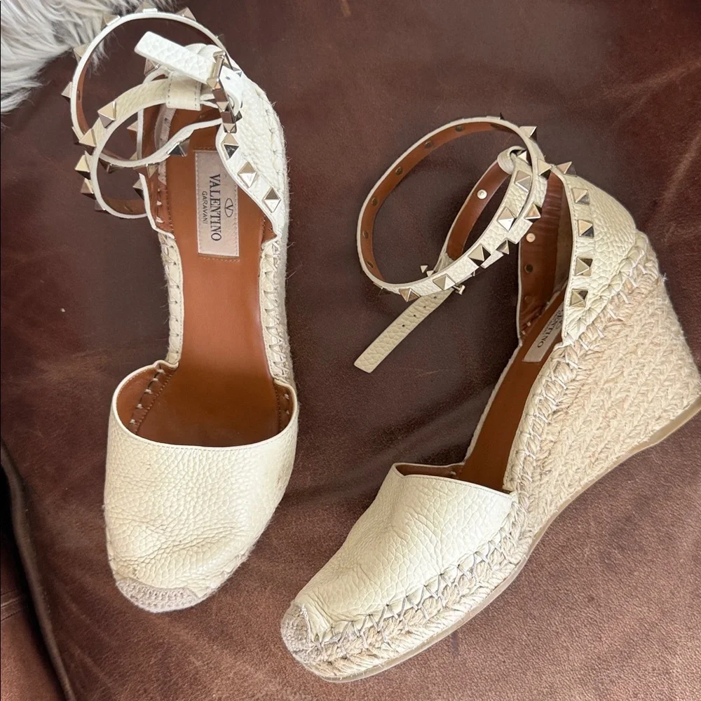 These are Valentino Garavani Rockstud textured-leather espadrille wedge heel